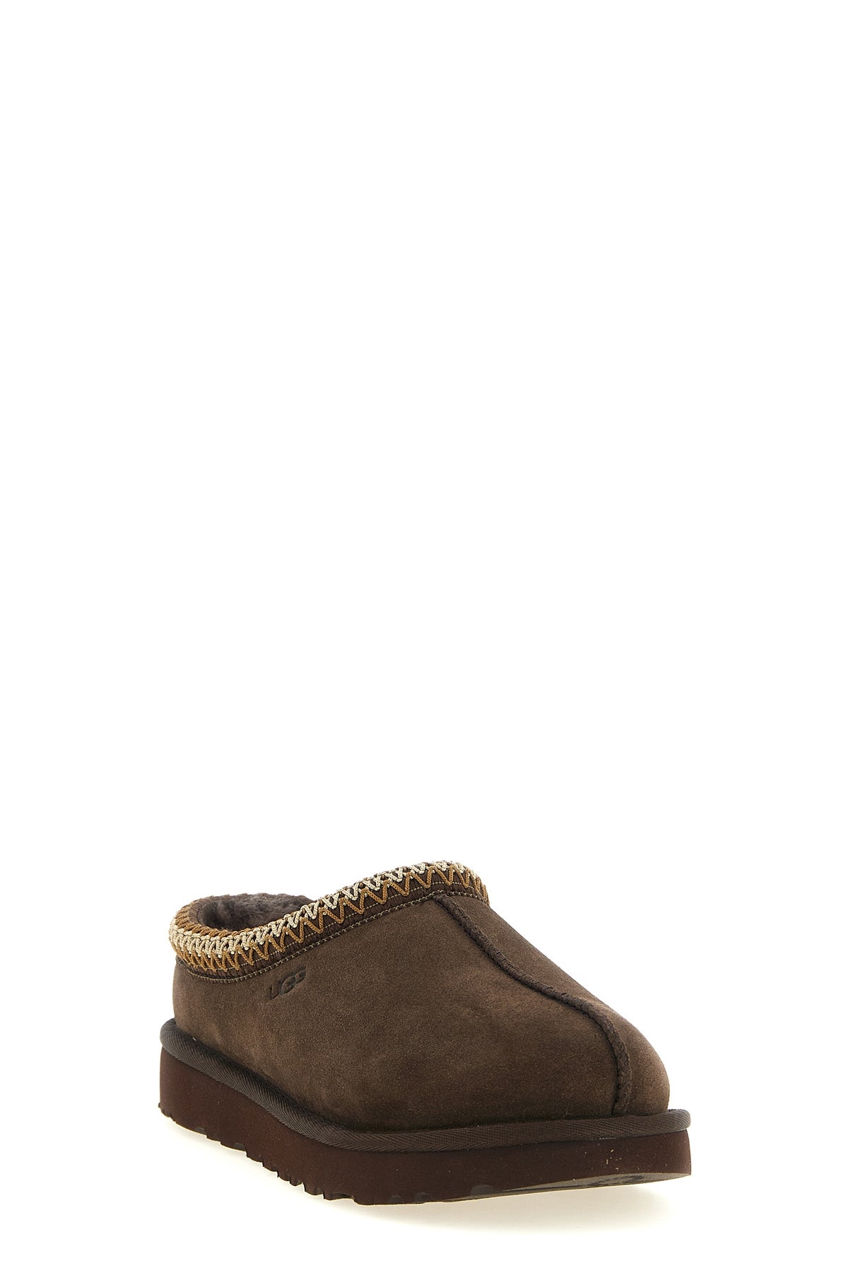 the sabot ugg sets new standards of comfort through a slip-on construction that