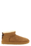 the ultra mini bailey bow ugg ankle boots redefines a brand icon through compa