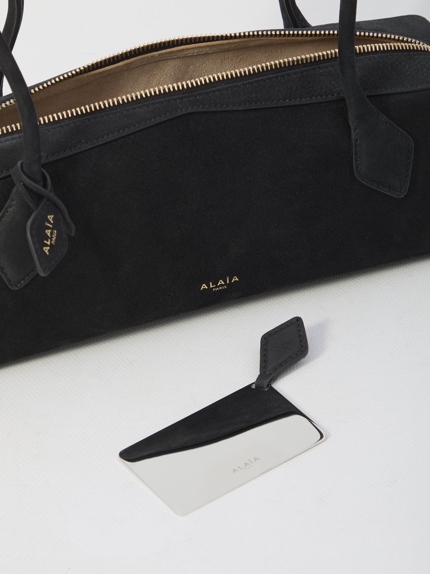 ALAIA OS le teckel medium bag in nubuck