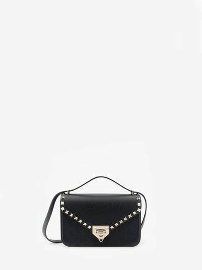 grained calfskin small rockstud crossbody bag