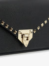 grained calfskin small rockstud crossbody bag