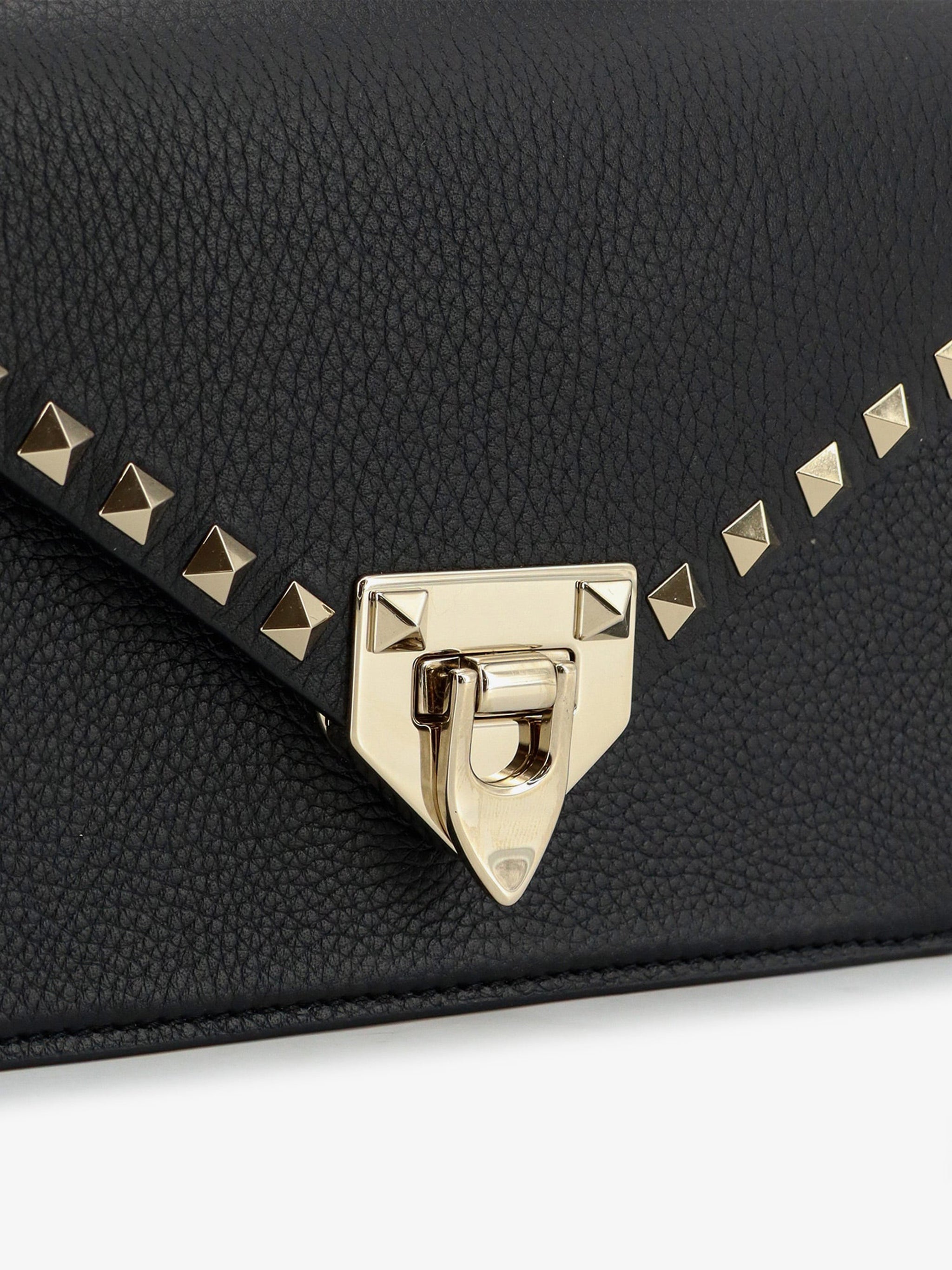 grained calfskin small rockstud crossbody bag