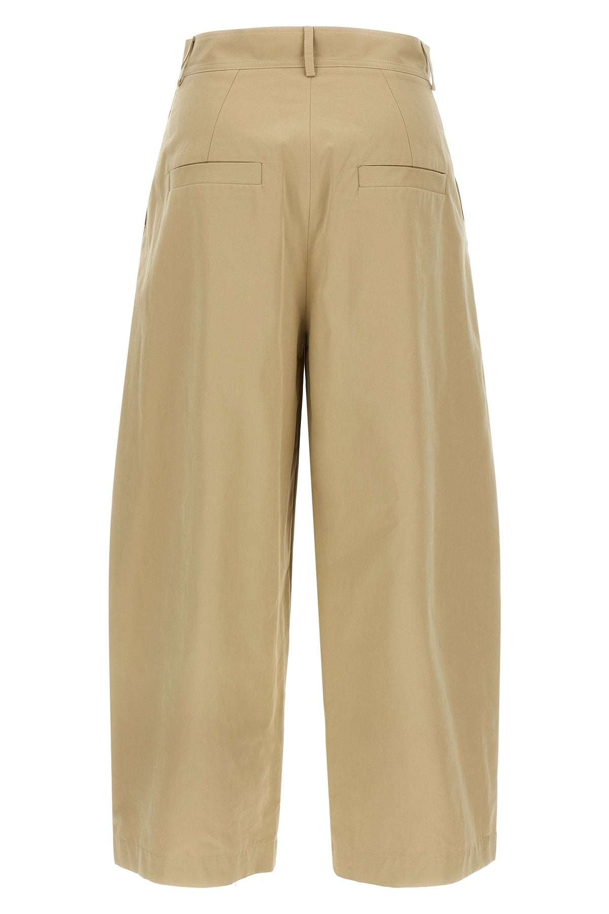 the nucleo canvas pants redefine the volumes of the daily wardrobe through a w