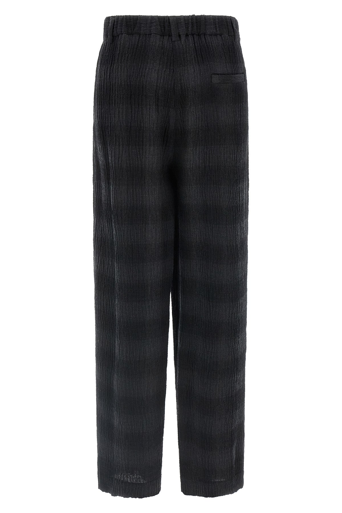 the tela victor trousers redefines the codes of contemporary tailoring through