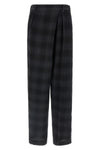 the tela victor trousers redefines the codes of contemporary tailoring through