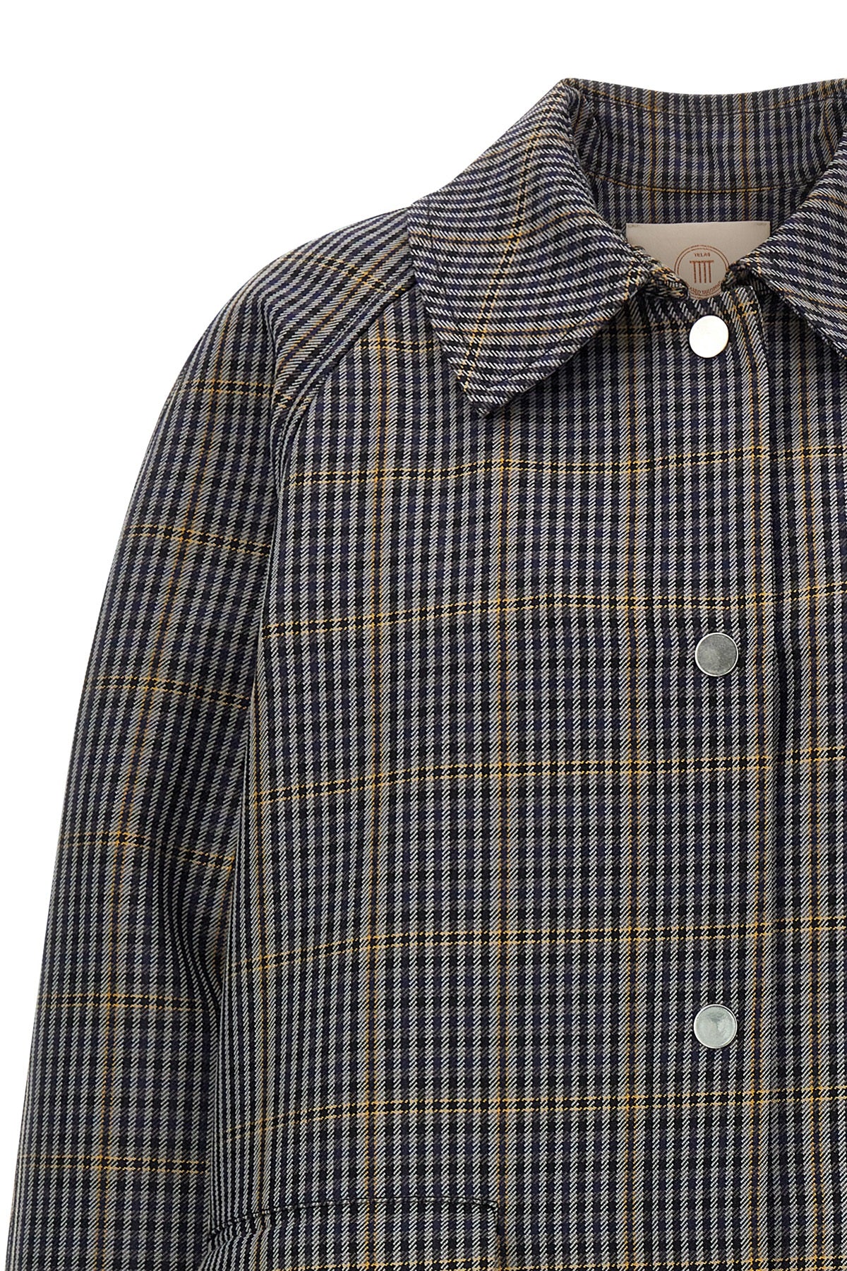the long trench coat tela nathan redefines the codes of outerwear through a ri