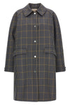 the long trench coat tela nathan redefines the codes of outerwear through a ri