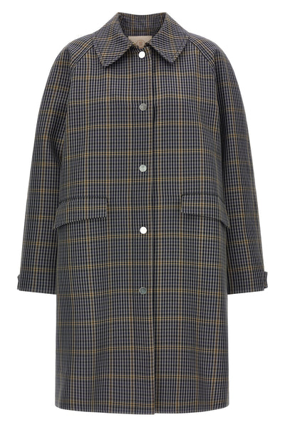the long trench coat tela nathan redefines the codes of outerwear through a ri