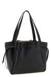 the tory burch romy tote bag defines everyday elegance through soft volumes and