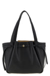 the tory burch romy tote bag defines everyday elegance through soft volumes and