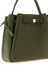 the tory burch romy bucket bag is made of fine hammered leather in the olive gre