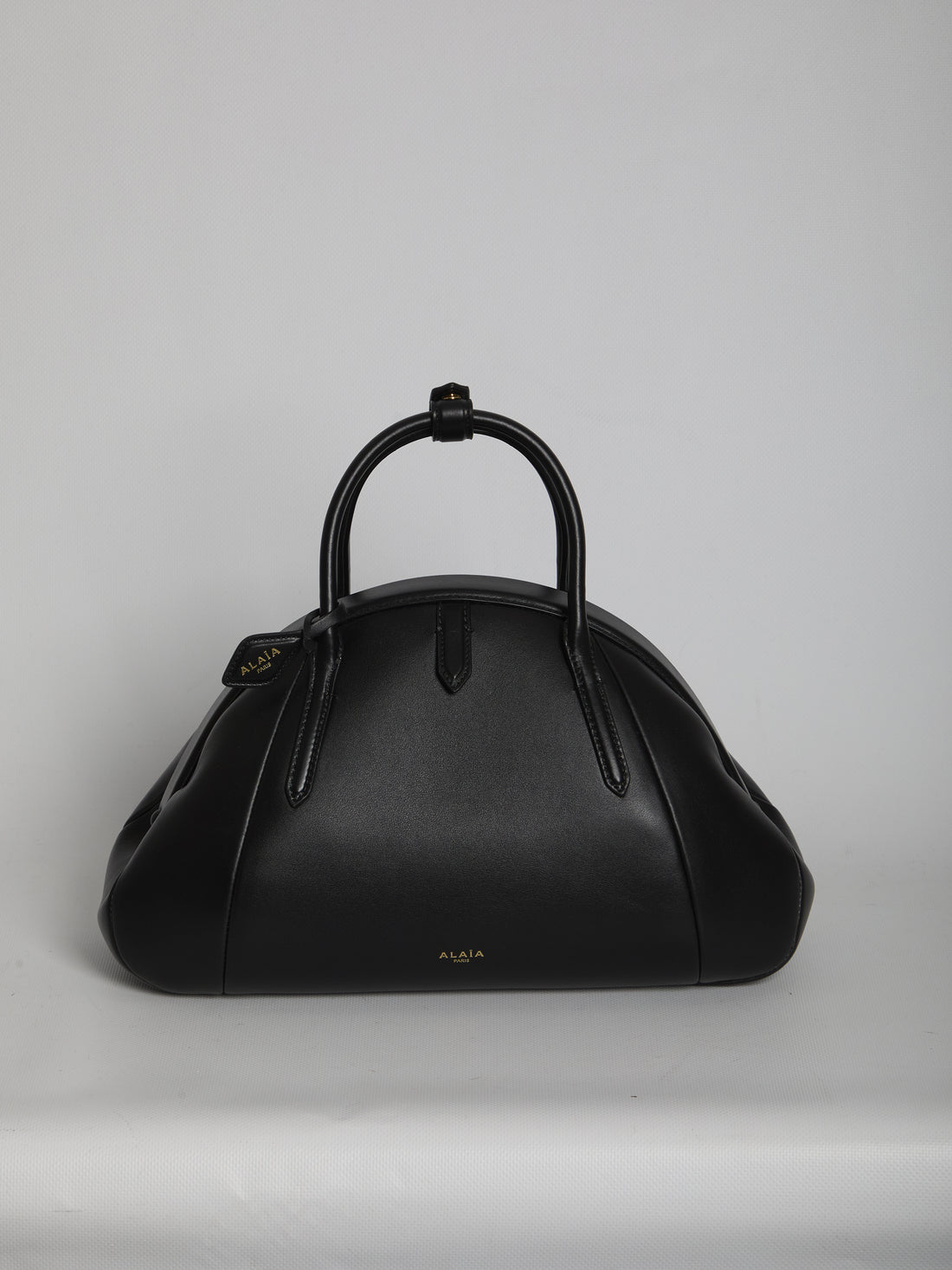 ALAIA OS top handle leather bag 