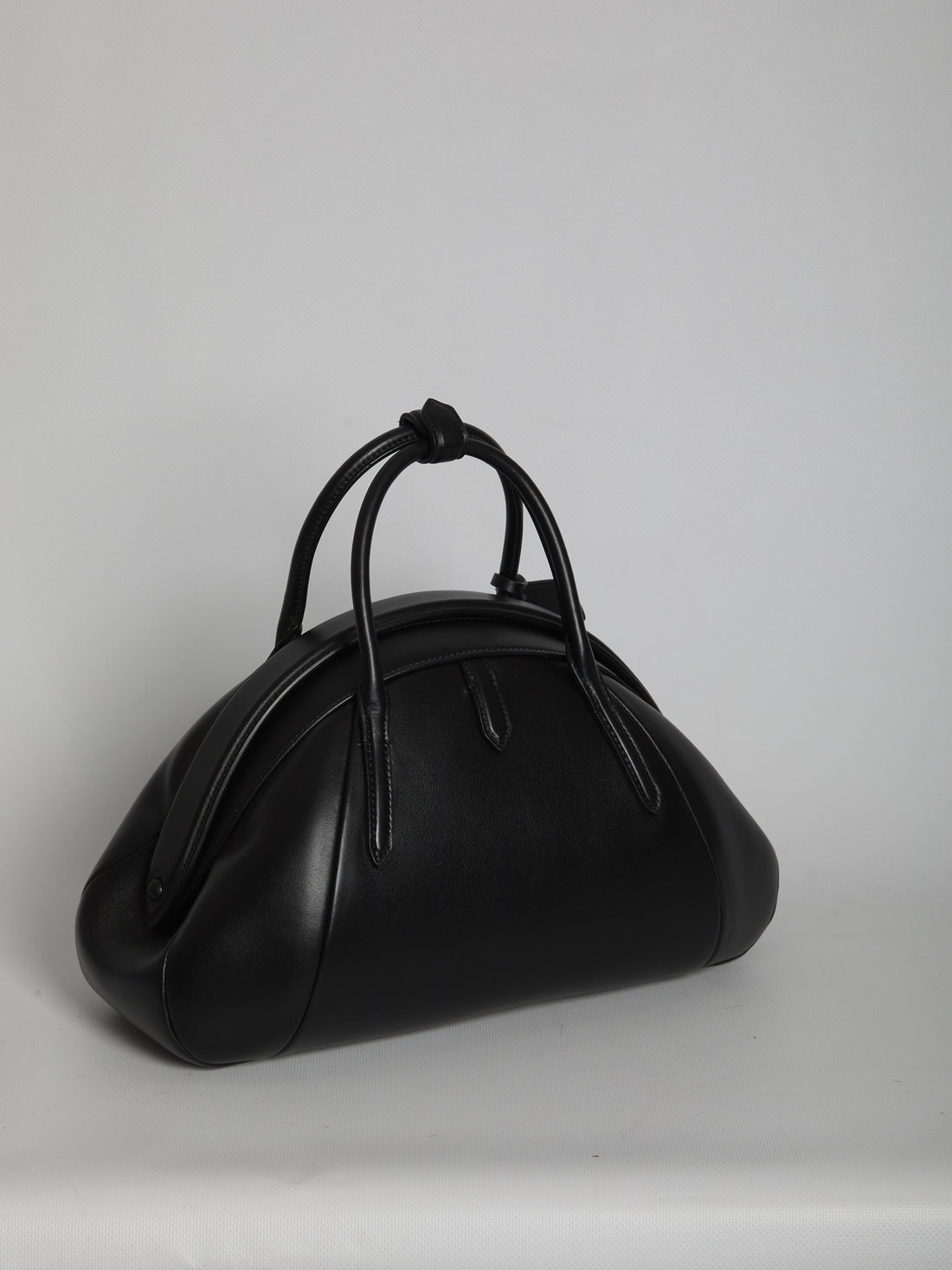 ALAIA OS top handle leather bag 