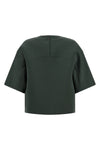 the emily tela crop blouse redefines the proportions of everyday wardrobe thro