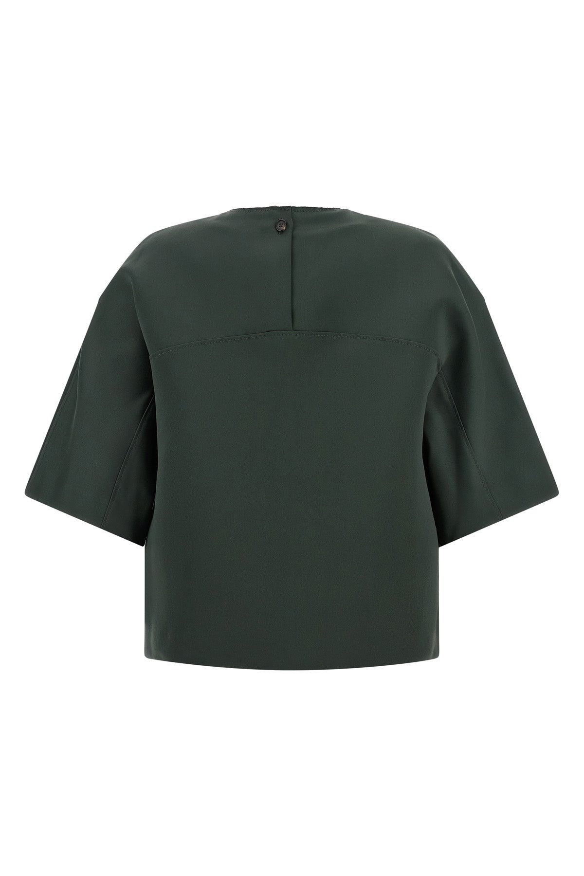 the emily tela crop blouse redefines the proportions of everyday wardrobe thro
