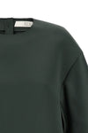 the emily tela crop blouse redefines the proportions of everyday wardrobe thro