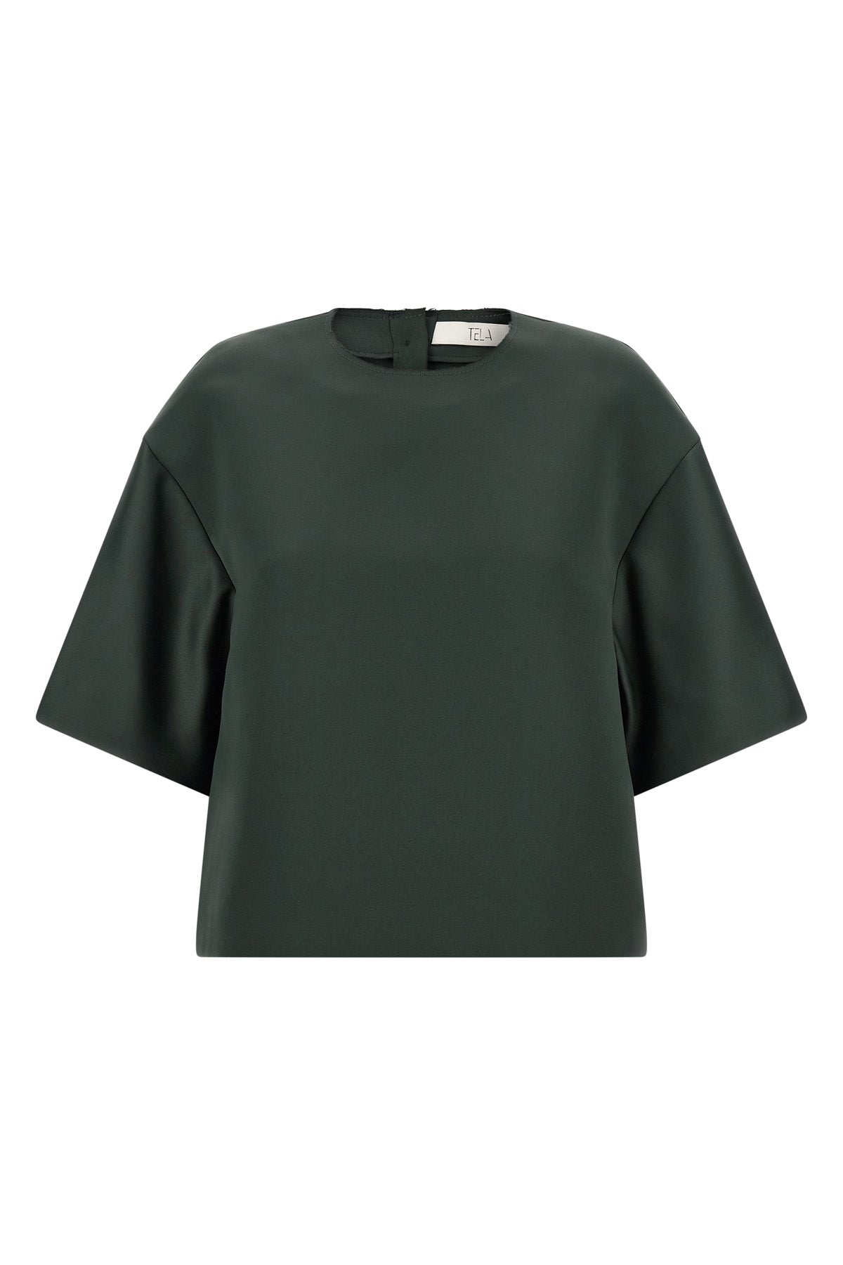 the emily tela crop blouse redefines the proportions of everyday wardrobe thro