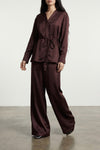 shiny fabric trousers