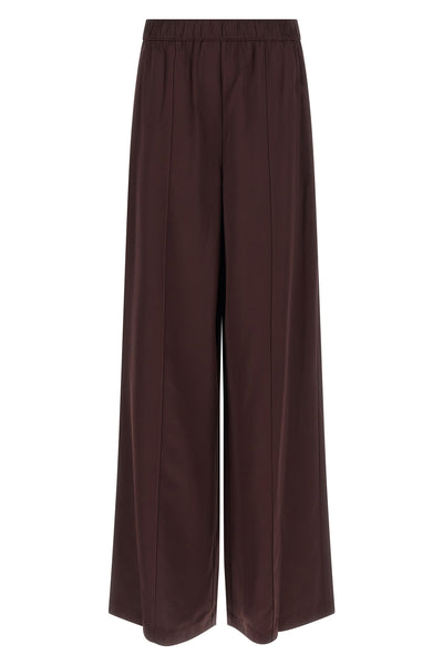 shiny fabric trousers