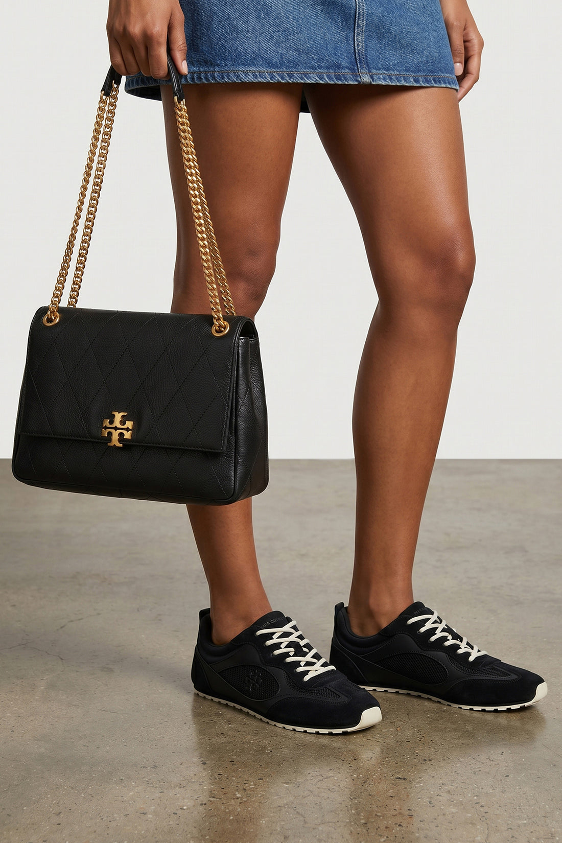 TORY BURCH 5.5 the tory burch field sneaker stands out for its low-top construction that blen