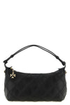 the tory burch fleming clutch redefines the codes of everyday elegance through
