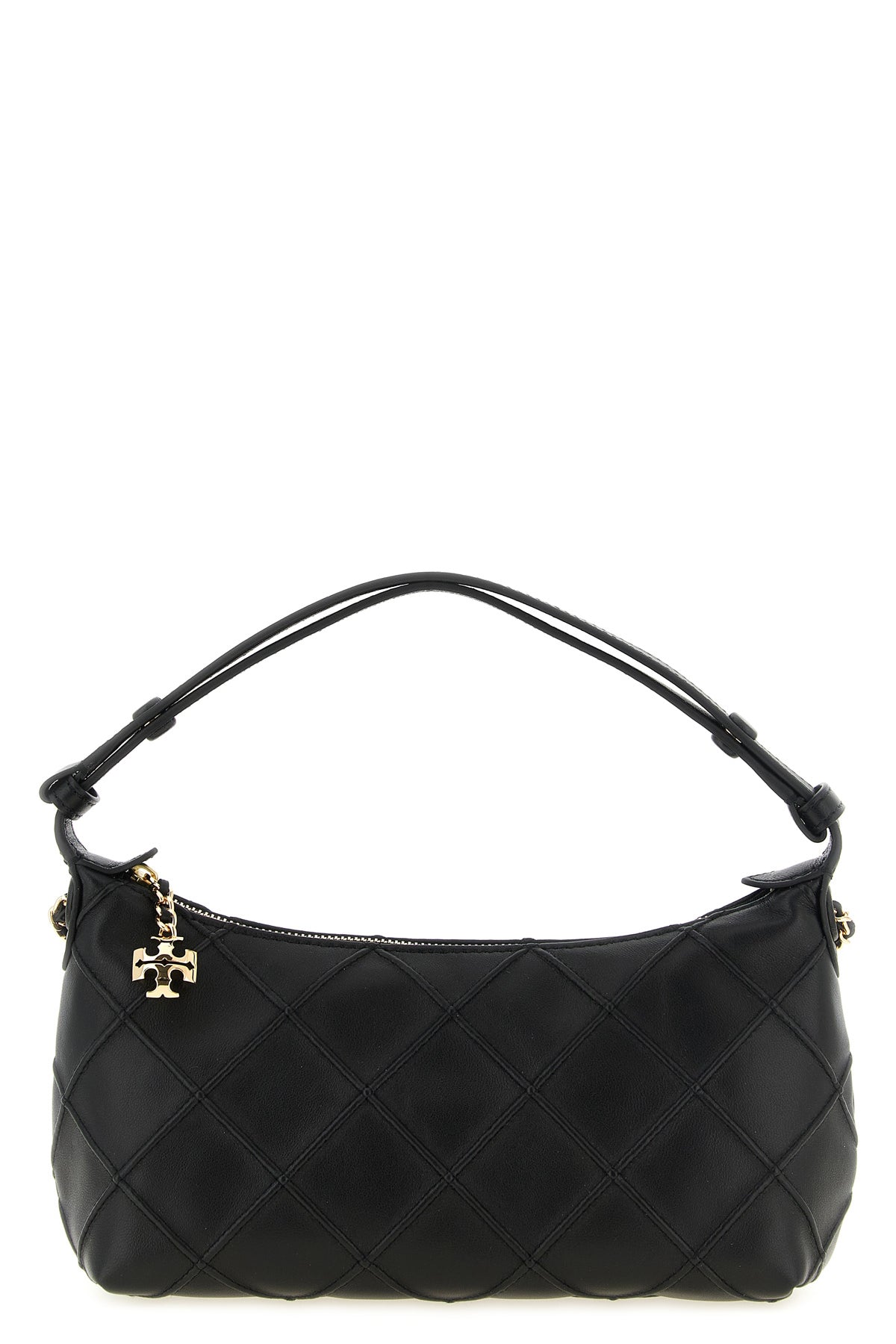 the tory burch fleming clutch redefines the codes of everyday elegance through
