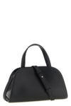 the tory burch romy small bauletto handbag is made of fine black hammered cowhid