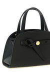 the tory burch romy small bauletto handbag is made of fine black hammered cowhid