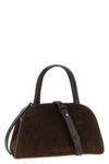 the tory burch romy small bauletto bag redefines everyday elegance through a sop