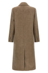 the tory burch coat defines a new concept of outerwear through sartorial volumes