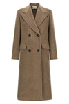 the tory burch coat defines a new concept of outerwear through sartorial volumes