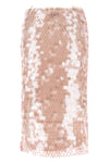 the tory burch skirt redefines the codes of the evening through a complex materi