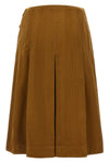 the pleated tory burch midi skirt defines a new concept of volume through a rigo