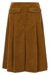the pleated tory burch midi skirt defines a new concept of volume through a rigo