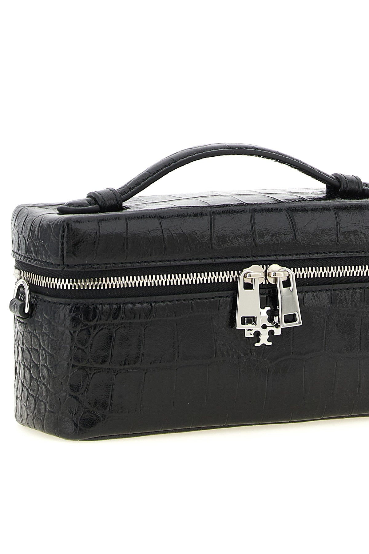 the tory burch charlie vanity case defines a structured silhouette