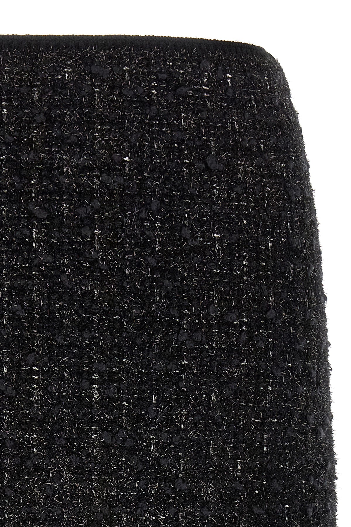 the tory burch midi skirt redefines the codes of contemporary tailoring