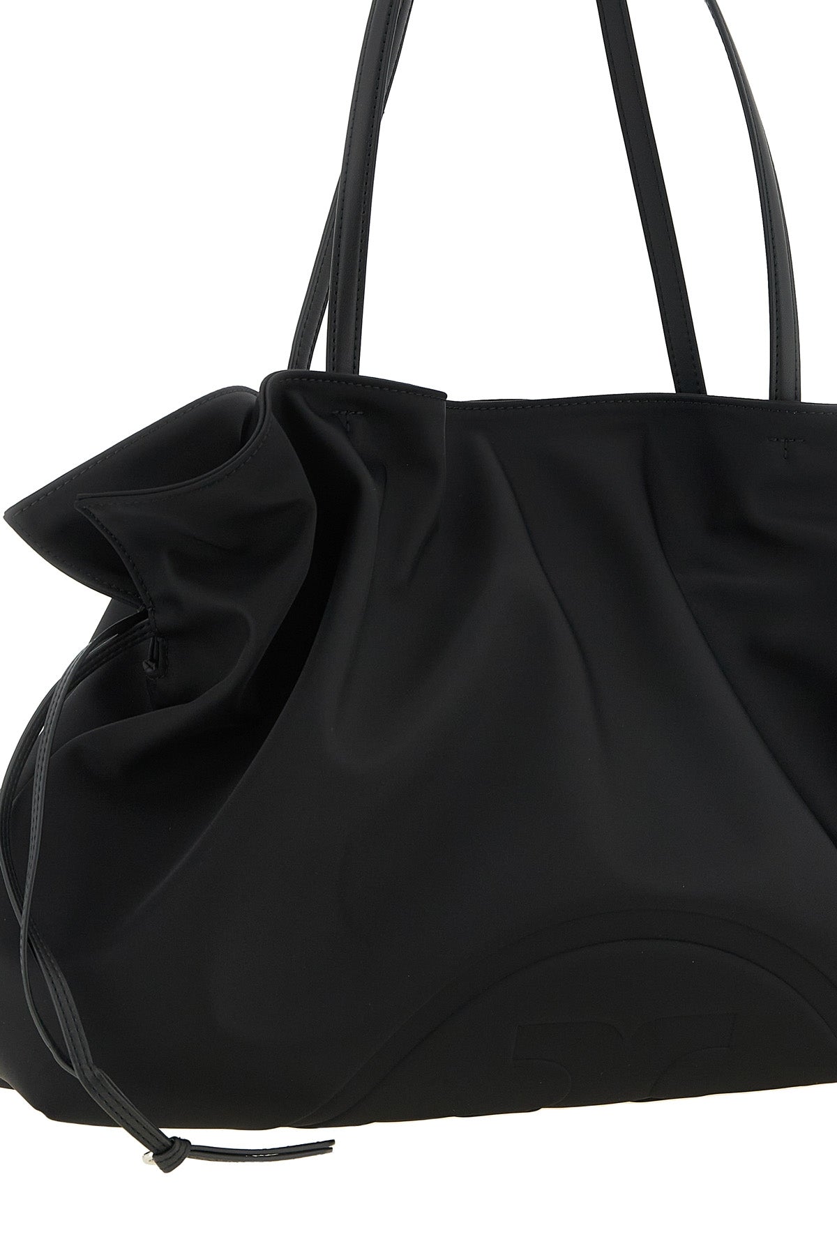 the tory burch ella drawstring shoulder bag redefines everyday volumes through