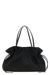 the tory burch ella drawstring shoulder bag redefines everyday volumes through