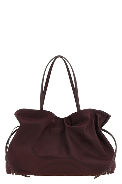 the tory burch ella nylon drawstring tote shoulder bag sets new standards of f