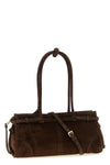 the prada bonnie medium handbag redefines the codes of everyday elegance through