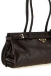 the prada bonnie medium handbag redefines classic volumes through an elongated