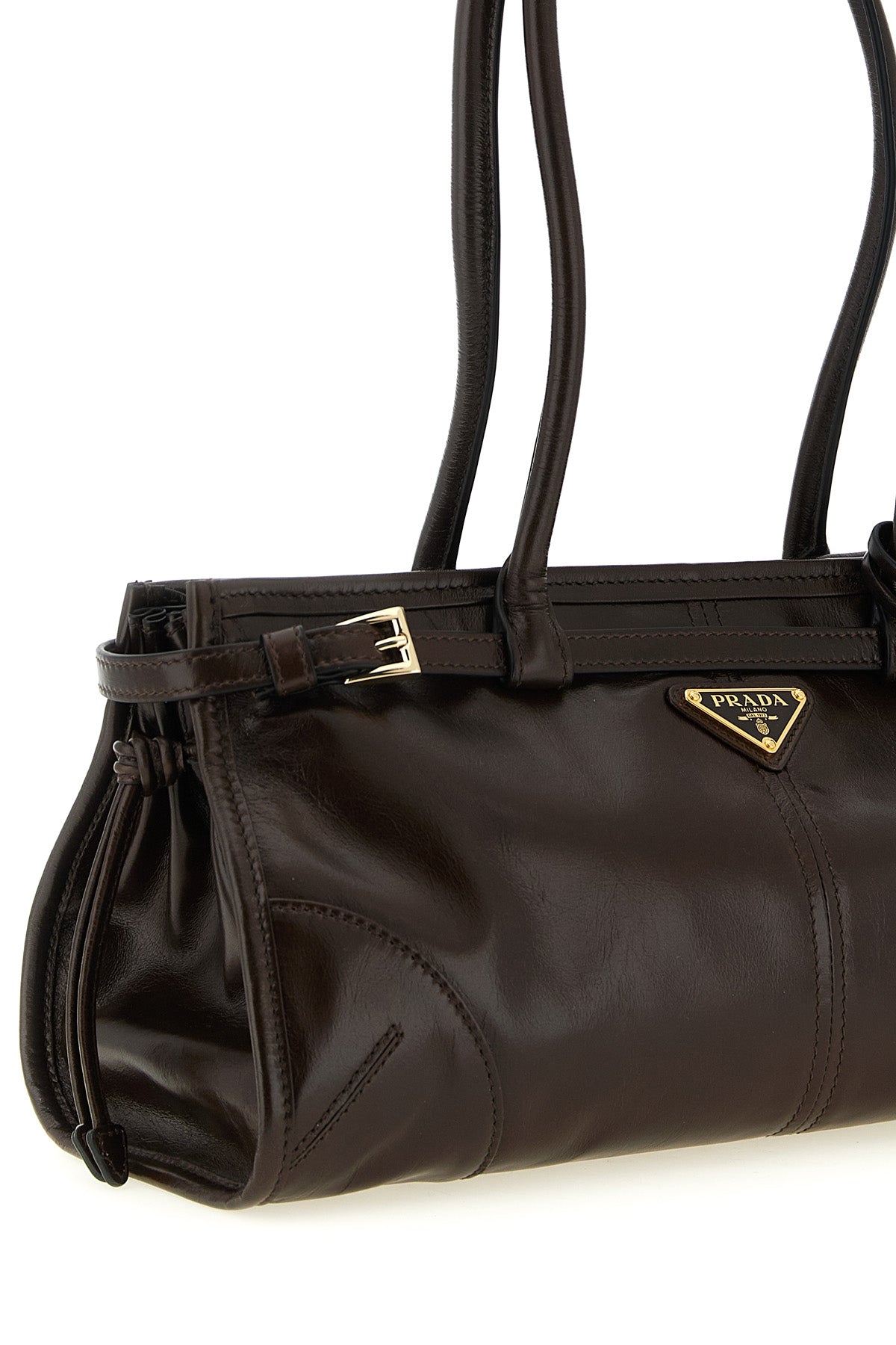the prada bonnie medium handbag redefines classic volumes through an elongated