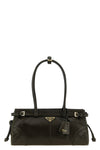 the prada bonnie midi handbag stands out for its elongated rectangular silhoue