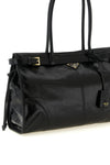 the prada soft lux handbag in fine calf leather stands out for its glossy and so