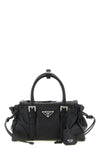 the small prada karin handbag in fine black hammered calf leather is distingui