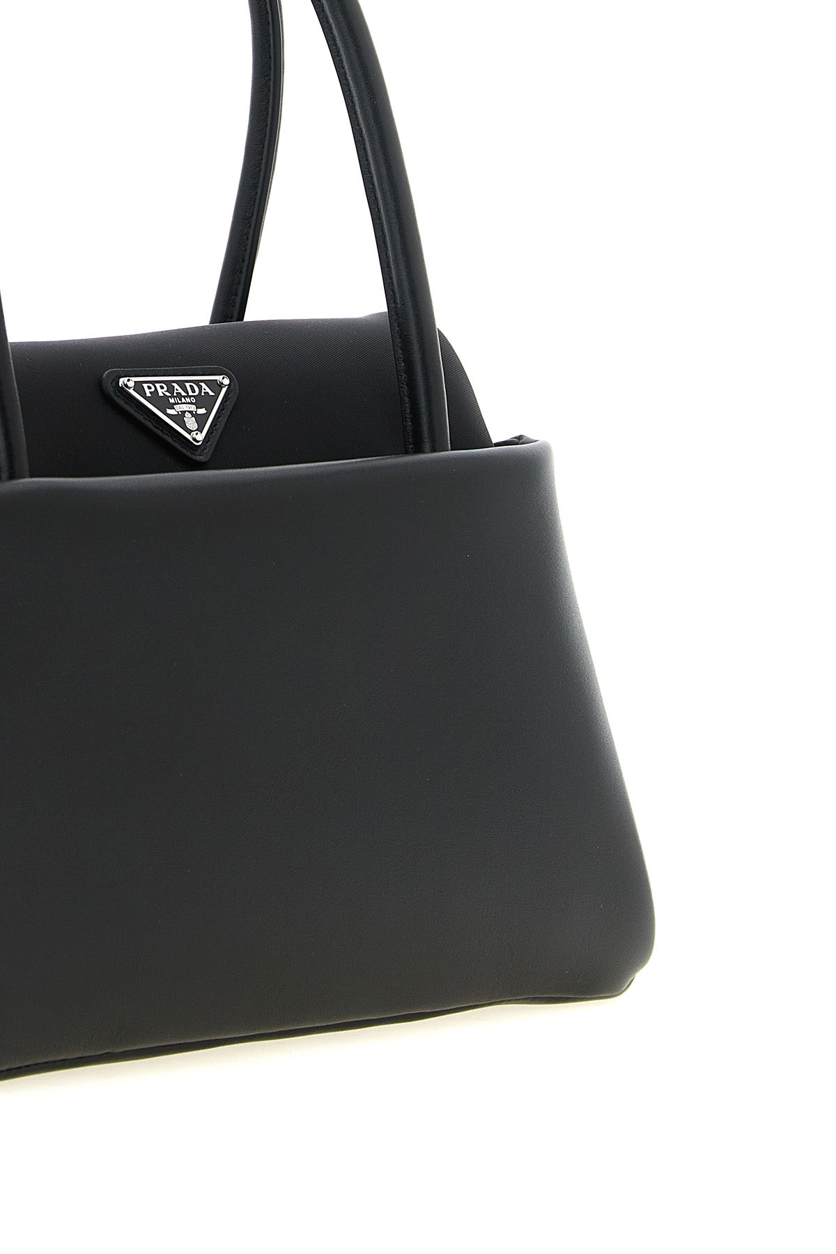 the prada passage small handbag defines a new geometry of luxury through an ar