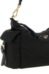 the large prada explore shoulder bag in black re-nylon defines a destructured