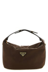 the prada chérie mini handbag redefines the codes of contemporary luxury throu