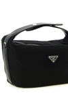 the prada chérie mini handbag defines an essential aesthetic through a compact