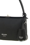 the prada midi handbag is made of fine saffiano calf leather